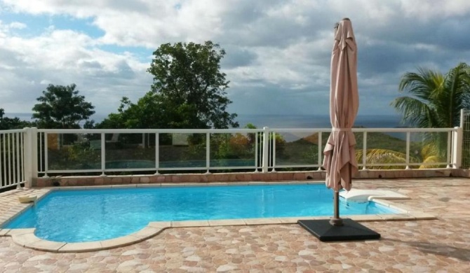 Appartement de 3 chambres avec vue sur la mer piscine partagee et jardin clos a Bouillante a 2 km de la plage