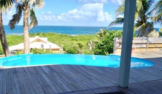 Villa de 4 chambres a Moule a 50 m de la plage avec vue sur la mer piscine privee et jardin clos