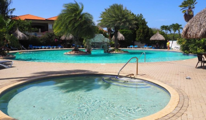 Kas di BaMi op Seru Coral Resort - Ruim appartement met groot zwembad en tropische tuin